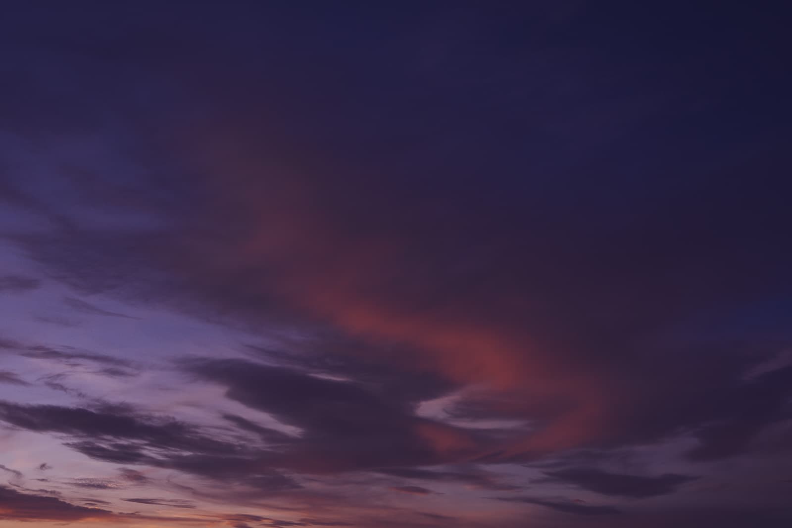 Sunset clouds over mountains
