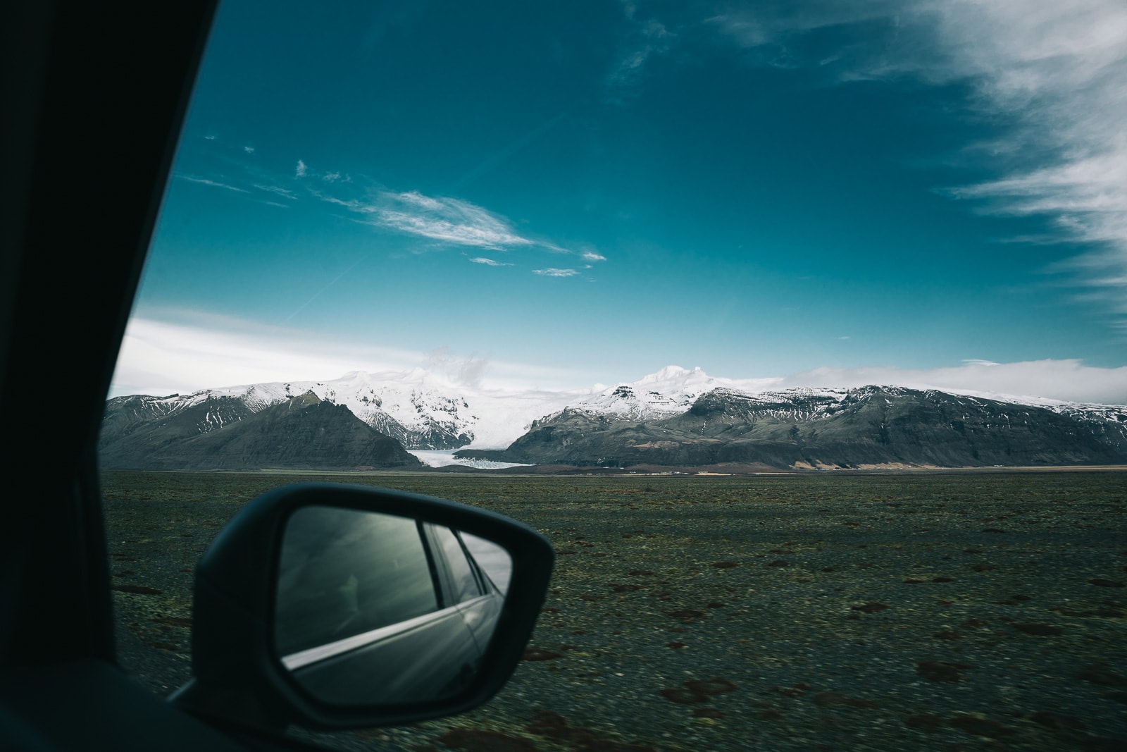 Lone road through Icelandic landscape